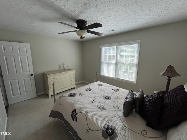 106 Carmel Woods Ct, Wake Forest, NC 27587 - carpeted bedroom featuring a textured ceiling and ceiling fan