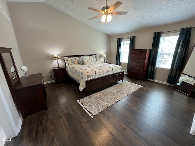 106 Carmel Woods Ct, Wake Forest, NC 27587 - bedroom with vaulted ceiling, a textured ceiling, dark wood-style floors, and ceiling fan