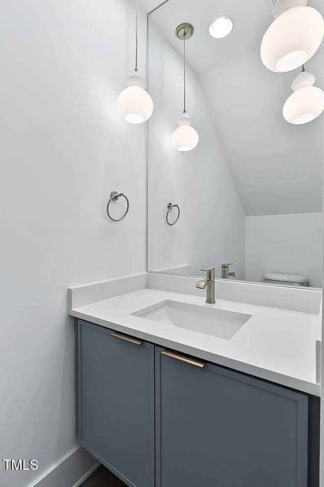 136 E End Ave, Durham, NC 27703 - bathroom with lofted ceiling and vanity