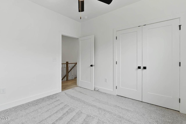 136 E End Ave, Durham, NC 27703 - unfurnished bedroom featuring carpet, a closet, and ceiling fan