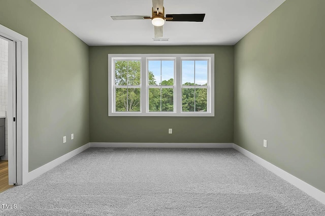136 E End Ave, Durham, NC 27703 - spare room with a ceiling fan and carpet flooring