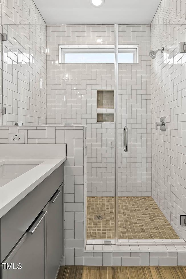 136 E End Ave, Durham, NC 27703 - full bath with a shower stall, vanity, and healthy amount of natural light
