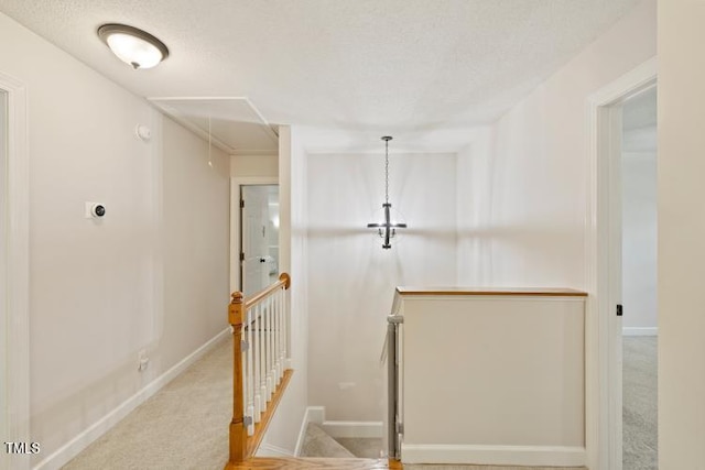 6425 Cross Ridge Dr, Holly Springs, NC 27540 - stairs with attic access and carpet flooring