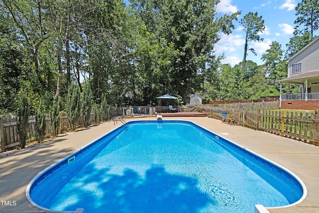 6425 Cross Ridge Dr, Holly Springs, NC 27540 - view of swimming pool with a fenced backyard