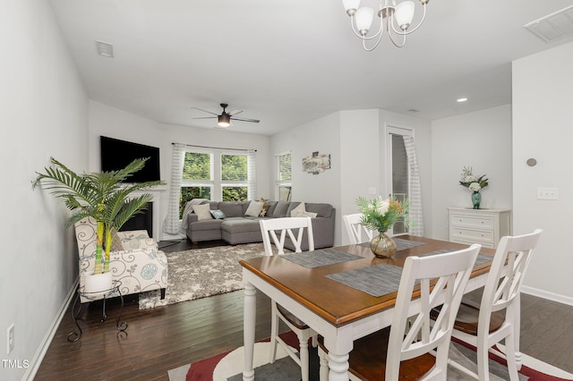155 Writing Rock Pl, Apex, NC 27539 - dining area featuring wood finished floors, ceiling fan, a chandelier, and recessed lighting