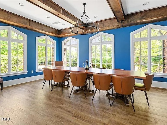 155 Writing Rock Pl, Apex, NC 27539 - dining space featuring a chandelier, wood finished floors, beam ceiling, and healthy amount of natural light