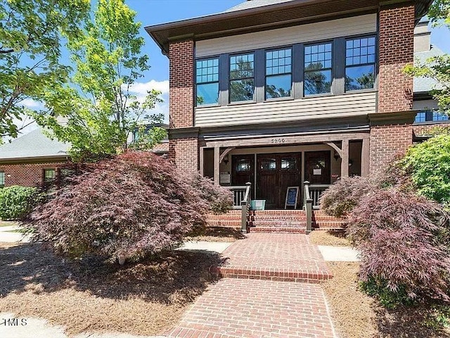155 Writing Rock Pl, Apex, NC 27539 - view of front of house featuring brick siding and covered porch