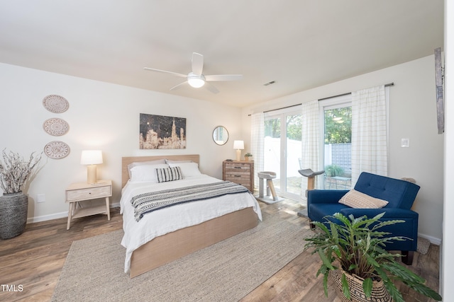 506 Cottage Ln, Durham, NC 27713 - bedroom featuring access to outside, wood finished floors, and a ceiling fan