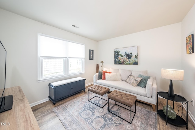 506 Cottage Ln, Durham, NC 27713 - living area featuring wood finished floors and baseboards