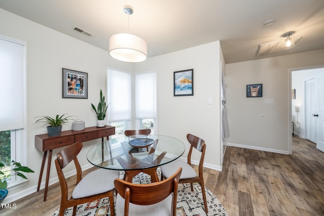 506 Cottage Ln, Durham, NC 27713 - dining room featuring healthy amount of natural light and wood finished floors