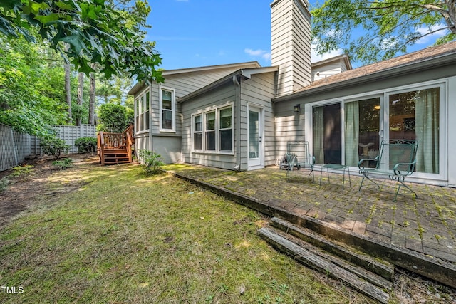 506 Cottage Ln, Durham, NC 27713 - back of property featuring a chimney and a patio