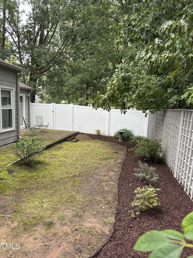 506 Cottage Ln, Durham, NC 27713 - fenced backyard featuring a gate