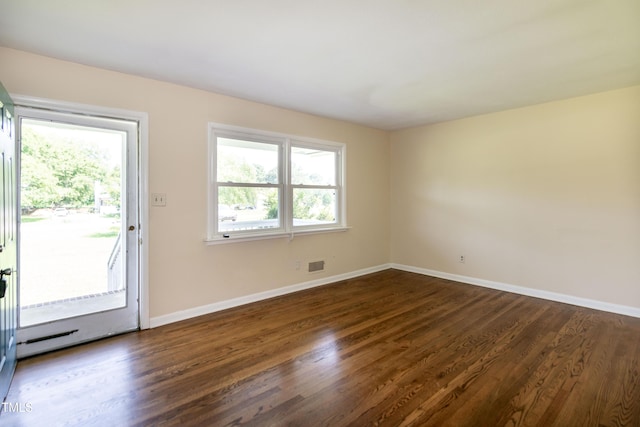 5840 Rocking Chair Dr, Youngsville, NC 27596 - spare room featuring dark wood-style flooring