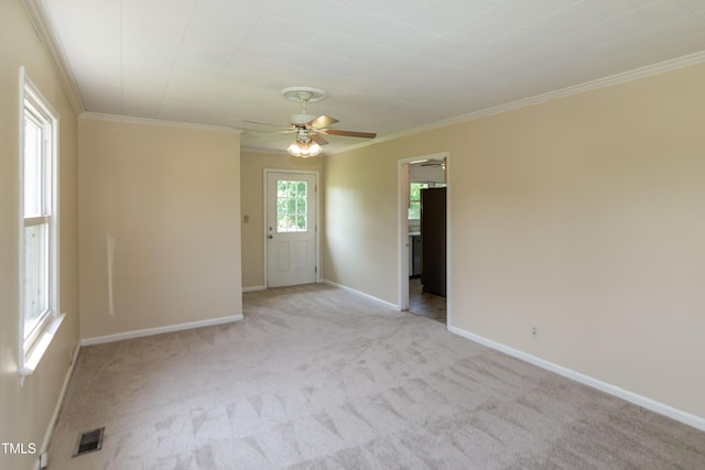 5840 Rocking Chair Dr, Youngsville, NC 27596 - empty room with ceiling fan, light carpet, and crown molding