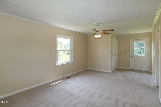 5840 Rocking Chair Dr, Youngsville, NC 27596 - unfurnished room featuring light colored carpet, plenty of natural light, crown molding, and ceiling fan