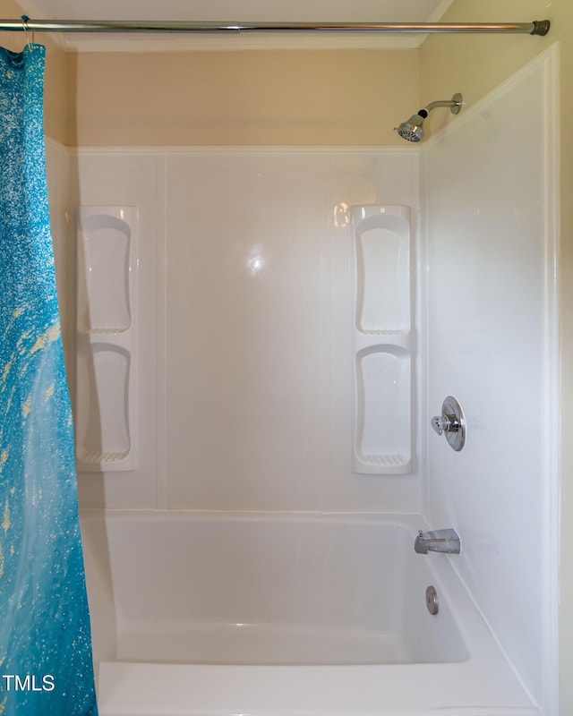 5840 Rocking Chair Dr, Youngsville, NC 27596 - bathroom with shower / bath combo
