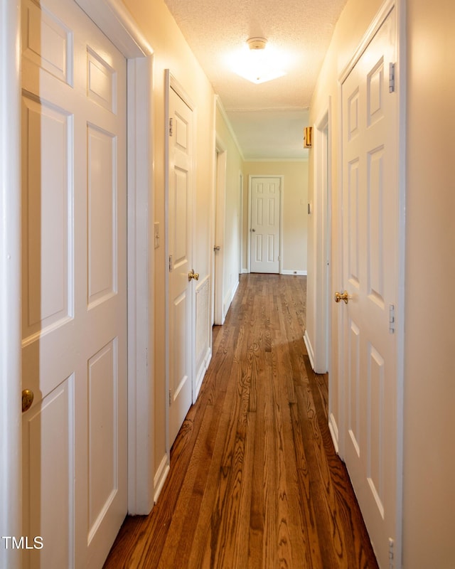 5840 Rocking Chair Dr, Youngsville, NC 27596 - corridor with dark wood-style flooring and baseboards