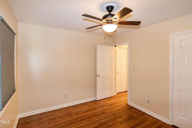 5840 Rocking Chair Dr, Youngsville, NC 27596 - unfurnished bedroom featuring wood finished floors and a ceiling fan