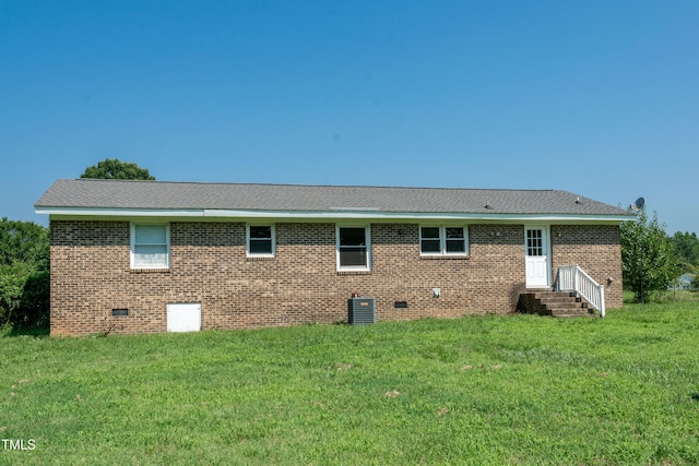 5840 Rocking Chair Dr, Youngsville, NC 27596 - back of house featuring crawl space, a lawn, and brick siding