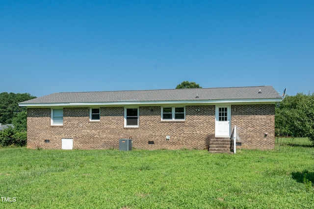5840 Rocking Chair Dr, Youngsville, NC 27596 - back of house featuring crawl space, entry steps, a yard, brick siding, and a shingled roof
