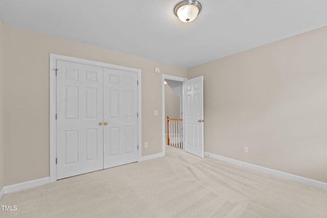 1806 White Dogwood Rd, Apex, NC 27502 - unfurnished bedroom featuring carpet and a closet