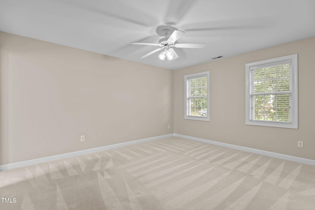 1806 White Dogwood Rd, Apex, NC 27502 - spare room with light colored carpet and a ceiling fan