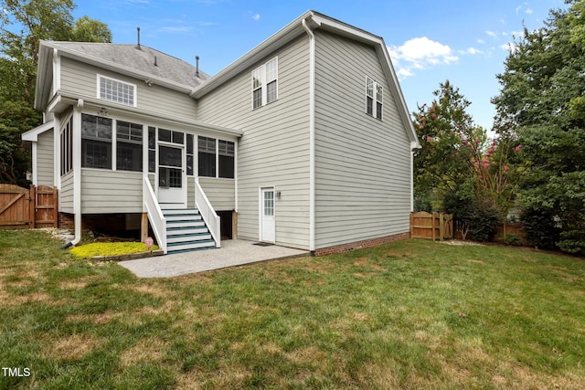 1806 White Dogwood Rd, Apex, NC 27502 - rear view of property with a gate, a sunroom, and a patio area