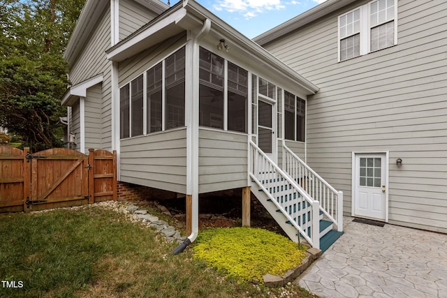 1806 White Dogwood Rd, Apex, NC 27502 - rear view of house with a sunroom, a gate, and a patio area