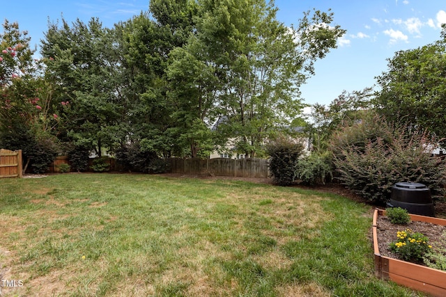 1806 White Dogwood Rd, Apex, NC 27502 - fenced backyard featuring a garden