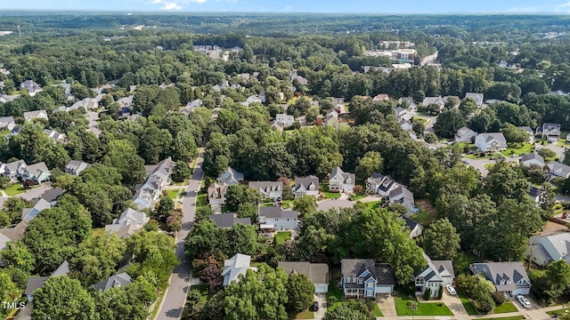 1806 White Dogwood Rd, Apex, NC 27502 - aerial view of property's location with nearby suburban area and a heavily wooded area