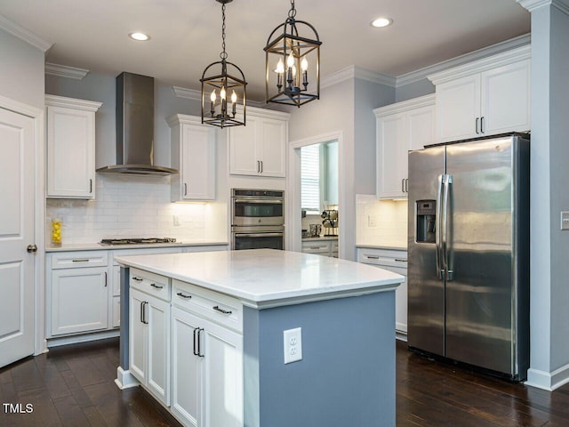 1004 Dogwood Bloom Ln, Knightdale, NC 27545 - kitchen featuring appliances with stainless steel finishes, wall chimney range hood, crown molding, a center island, and a chandelier