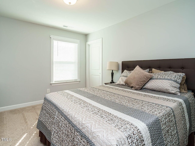 1004 Dogwood Bloom Ln, Knightdale, NC 27545 - carpeted bedroom featuring baseboards