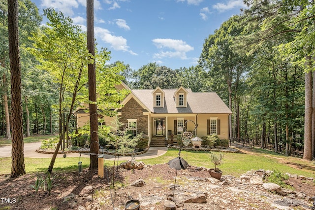 1513 Anterra Dr, Wake Forest, NC 27587 - view of front of house featuring a porch and a front lawn
