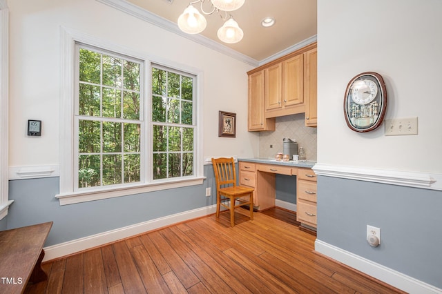 1513 Anterra Dr, Wake Forest, NC 27587 - office with a chandelier, ornamental molding, light wood-style floors, built in study area, and recessed lighting