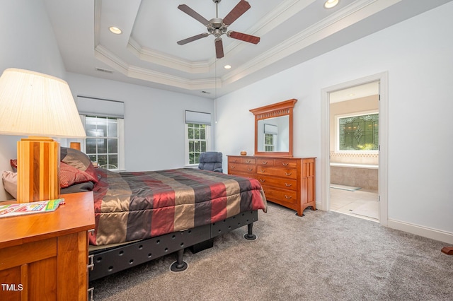 1513 Anterra Dr, Wake Forest, NC 27587 - bedroom with light colored carpet, ornamental molding, a tray ceiling, connected bathroom, and recessed lighting