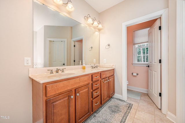 1513 Anterra Dr, Wake Forest, NC 27587 - bathroom with double vanity and tile patterned floors