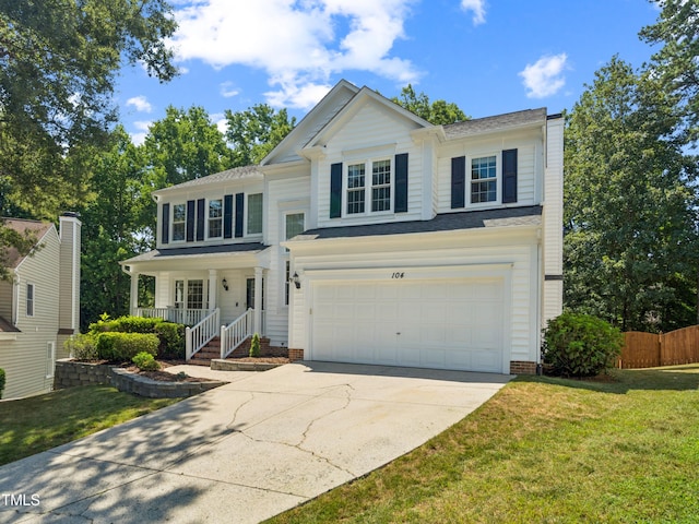 104 Pellinore Ct, Cary, NC 27513 - traditional home with a garage, concrete driveway, and a porch