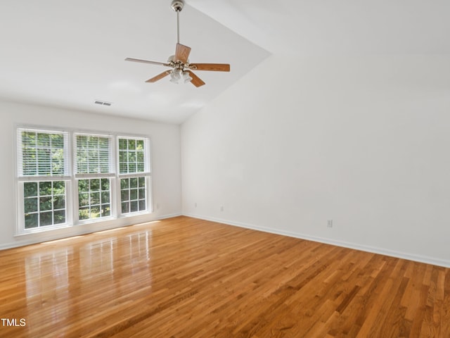 104 Pellinore Ct, Cary, NC 27513 - spare room featuring lofted ceiling, a ceiling fan, and light wood finished floors