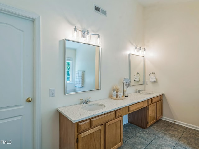 104 Pellinore Ct, Cary, NC 27513 - full bathroom with double vanity and tile patterned floors