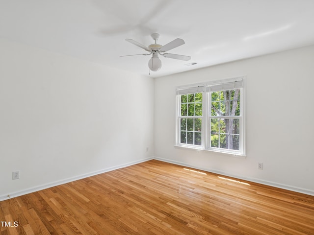 104 Pellinore Ct, Cary, NC 27513 - empty room with wood finished floors and ceiling fan