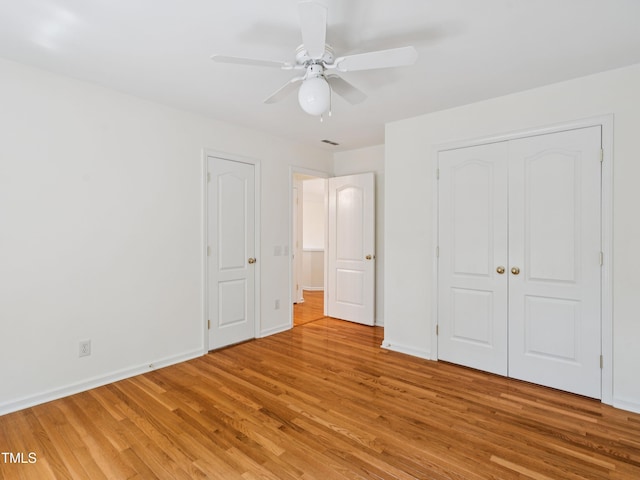 104 Pellinore Ct, Cary, NC 27513 - unfurnished bedroom with light wood-style floors and a ceiling fan