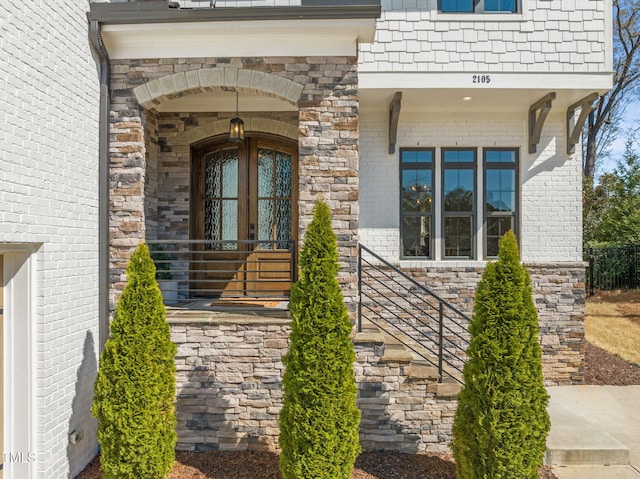 2105 Gardenbrook Dr, Raleigh, NC 27606 - property entrance with brick siding and stone siding