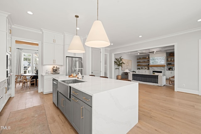 2105 Gardenbrook Dr, Raleigh, NC 27606 - kitchen with ornamental molding, white cabinetry, gray cabinets, light wood-style flooring, and open floor plan