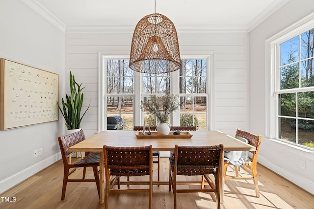 2105 Gardenbrook Dr, Raleigh, NC 27606 - dining room with crown molding, light wood finished floors, and plenty of natural light