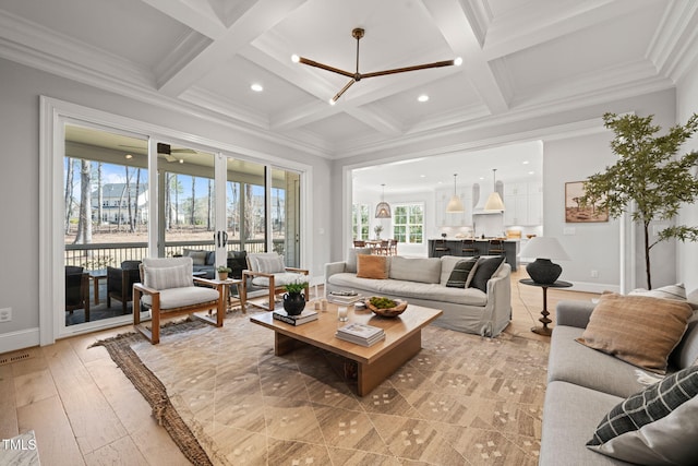 2105 Gardenbrook Dr, Raleigh, NC 27606 - living room with healthy amount of natural light, beam ceiling, coffered ceiling, crown molding, and recessed lighting