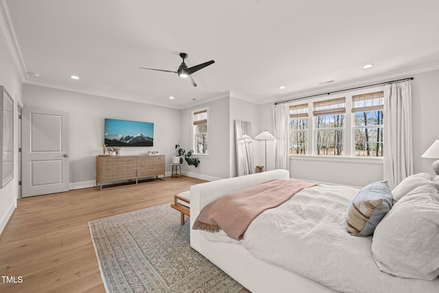 2105 Gardenbrook Dr, Raleigh, NC 27606 - bedroom with crown molding, recessed lighting, light wood-style floors, and ceiling fan