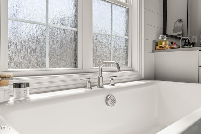 2105 Gardenbrook Dr, Raleigh, NC 27606 - bathroom featuring a sink and a freestanding tub