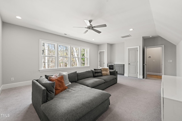 2105 Gardenbrook Dr, Raleigh, NC 27606 - living area with light carpet, a ceiling fan, recessed lighting, wine cooler, and vaulted ceiling