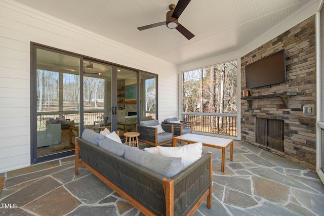 2105 Gardenbrook Dr, Raleigh, NC 27606 - view of patio with an outdoor living space with a fireplace and ceiling fan