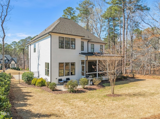 2105 Gardenbrook Dr, Raleigh, NC 27606 - back of house with roof with shingles, a patio area, and a gate